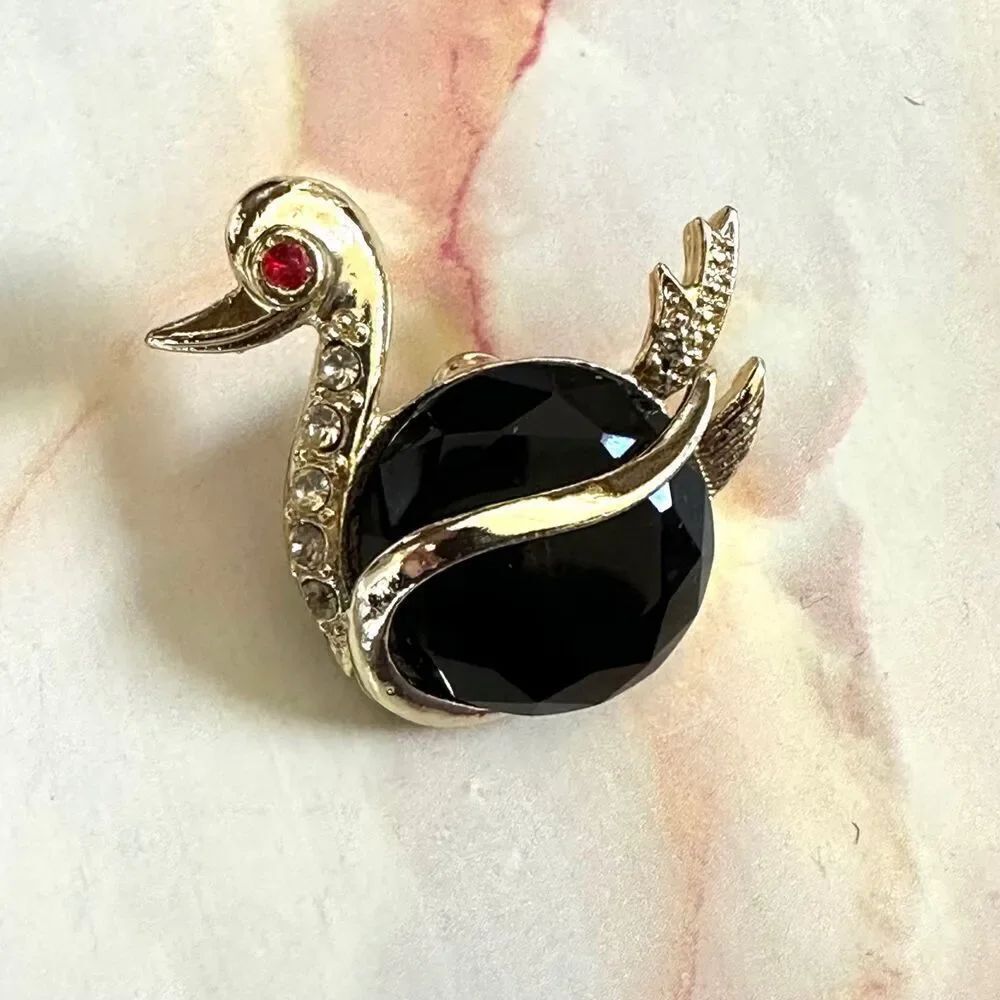 Swan vintage gold tone black brooch
